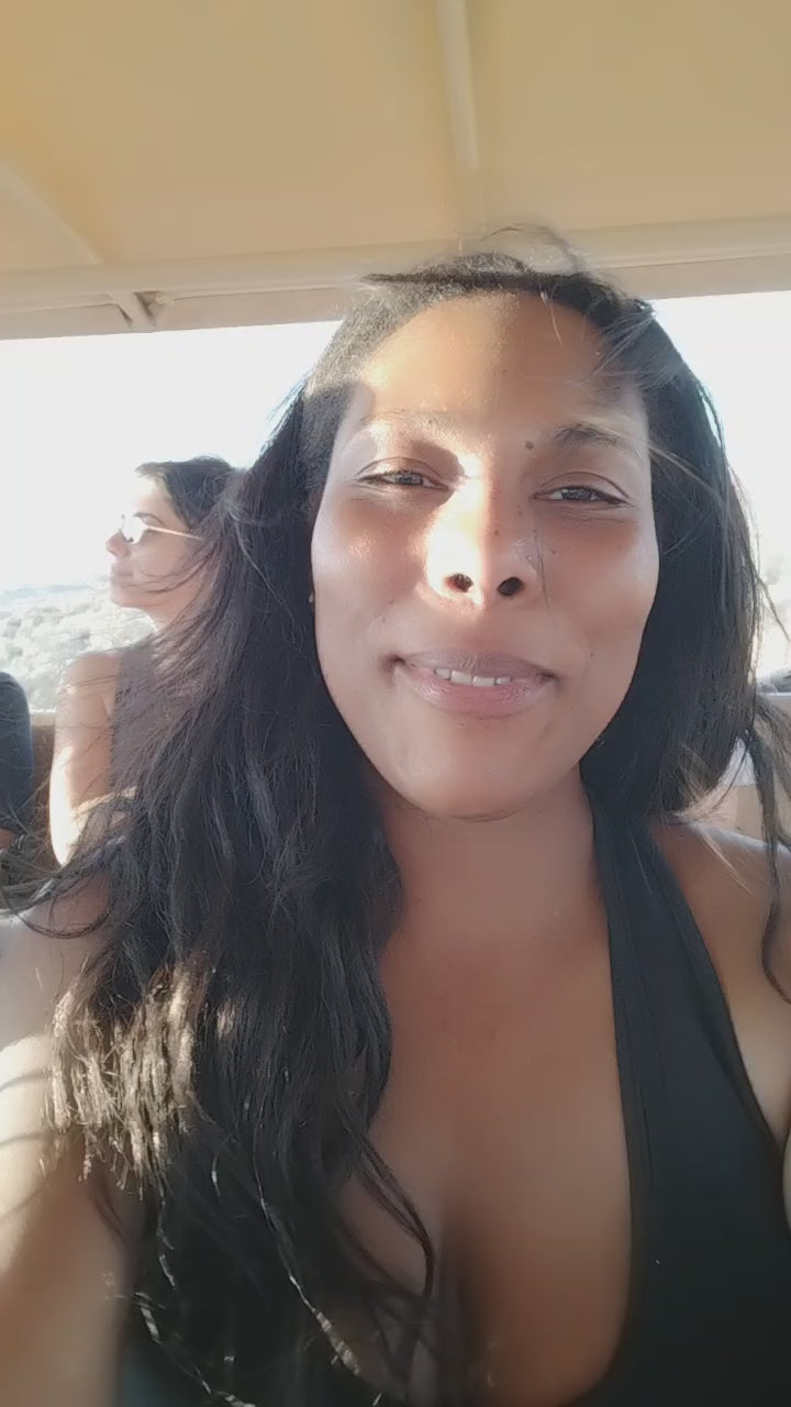 Close-up of kinky straight textured hair extensions holding shape in desert heat and outdoor conditions